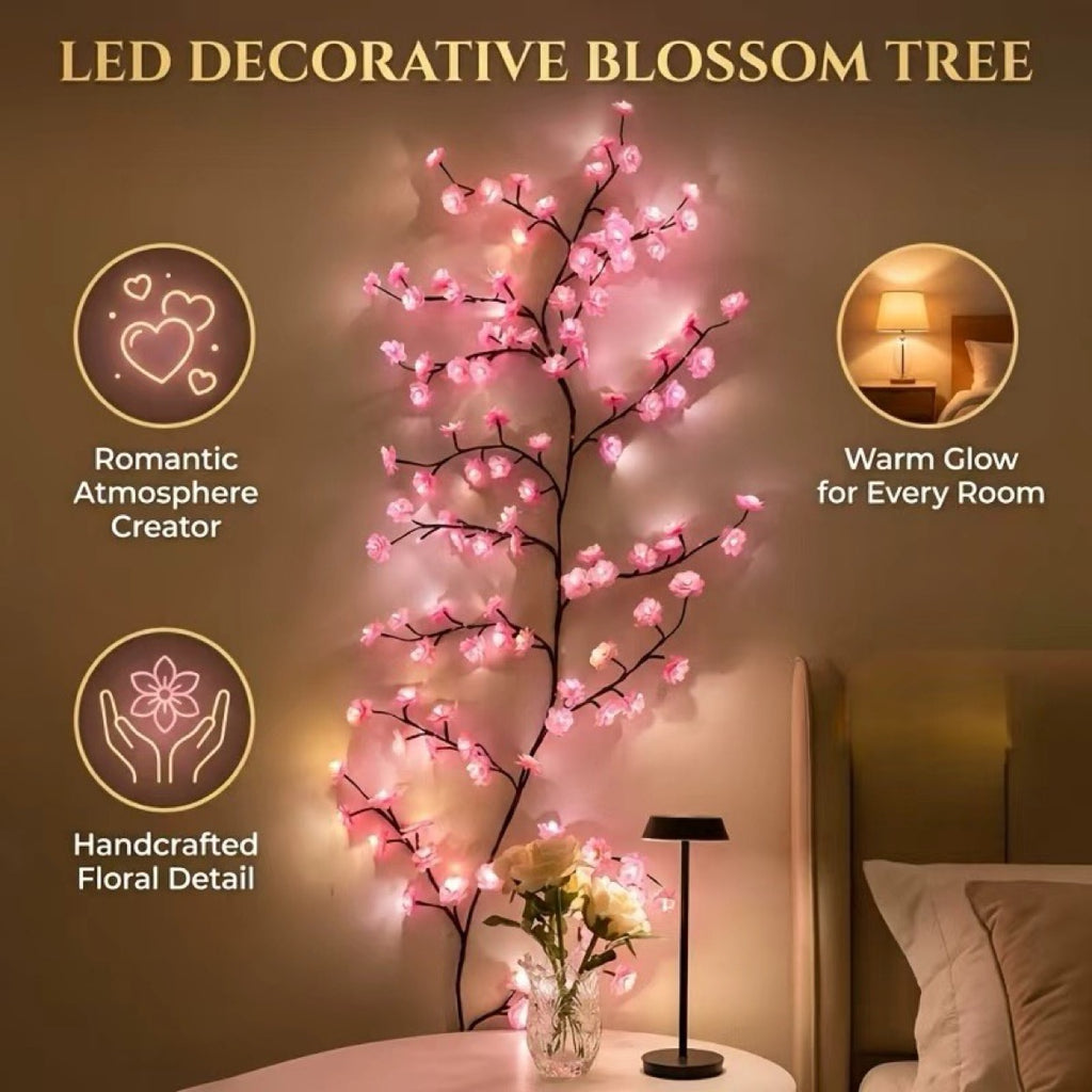 Cherry blossom LED branch lights glowing on bedroom wall