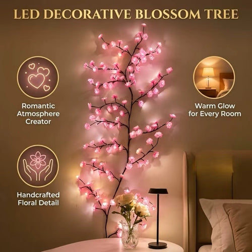 Cherry blossom LED branch lights glowing on bedroom wall