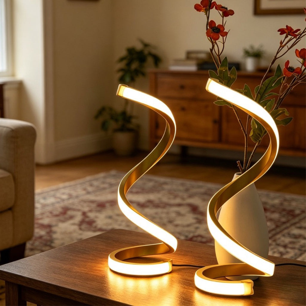 Two golden spiral LED lamps in a living room